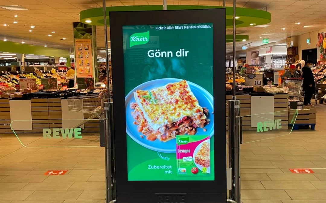 Rewe wird programmatisch